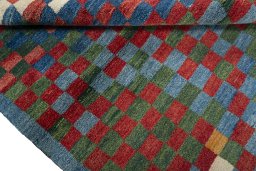 Full view of 2000s Persian Gabbeh rug from Pakistan, 215 × 153 cm in Blue tones
