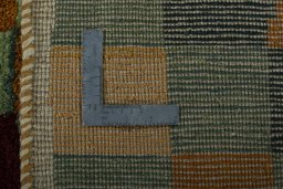 Close-up detail of 2000s Persian Gabbeh rug from Pakistan showing Wool weave