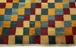 Central medallion detail of 2000s Persian Gabbeh rug from Pakistan