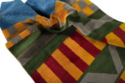 Corner detail of New Persian Gabbeh rug showing border pattern and Wool pile