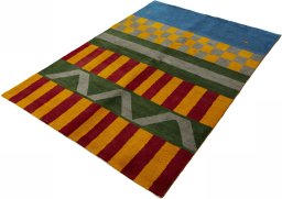 Corner detail of New Persian Gabbeh rug showing border pattern and Wool pile