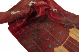 Corner detail of New Persian Gabbeh rug showing border pattern and Wool pile