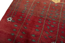Backside of handmade New Persian Gabbeh rug showing knot structure and weave density