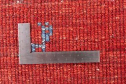 Close-up detail of 1975s Persian Gabbeh rug from Iran / Persia showing Wool weave
