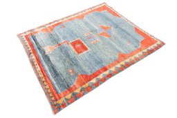 Corner detail of 1975s Persian Gabbeh rug showing border pattern and Wool pile