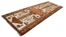 Corner detail of 2000s Persian Gabbeh rug showing border pattern and Wool pile