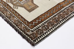 Backside of handmade 2000s Persian Gabbeh rug showing knot structure and weave density