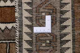 Full view of 2000s Persian Gabbeh rug from Iran / Persia, 225 × 105 cm in Beige tones
