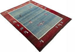 Close-up detail of 2000s Persian Gabbeh rug from Pakistan showing Wool weave