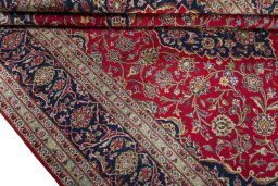 Close-up detail of 2000s Kashan rug from Iran / Persia showing Wool weave