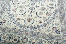 Close-up detail of 2000s Nain rug from Iran / Persia showing Wool weave