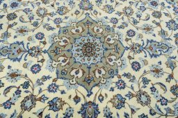Central medallion detail of 2000s Kashan rug from Iran / Persia