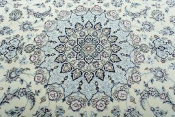 Central medallion detail of 2000s Nain rug from Iran / Persia