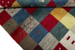 Full view of 2000s Persian Gabbeh rug from Pakistan, 190 × 148 cm in Multi Color tones