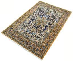 Corner detail of 1970s Ghom rug showing border pattern and Wool pile