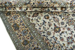Close-up detail of 2000s Kashan rug from Iran / Persia showing Wool weave