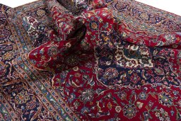 Surface texture of 2000s Kashan rug with natural Wool and intricate pattern