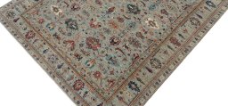 Backside of handmade New Kazak rug showing knot structure and weave density