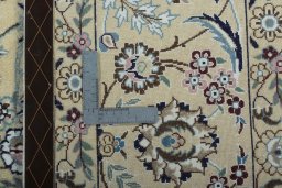 Backside of handmade 2000s Nain rug showing knot structure and weave density