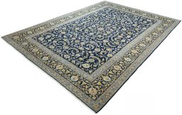 Corner detail of 2000s Kashan rug showing border pattern and Wool pile