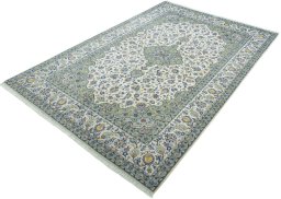 Corner detail of New Kashan rug showing border pattern and Cork pile