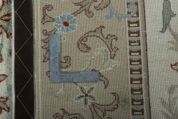 Backside of handmade New Kashmar rug showing knot structure and weave density