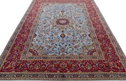 Surface texture of 2000s Kashan rug with natural Wool and intricate pattern