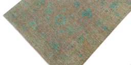 Backside of handmade New Farahan rug showing knot structure and weave density