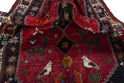 Corner detail of 2000s Shiraz rug showing border pattern and Wool pile