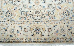 Full view of New Kashan rug from Iran / Persia, 295 × 190 cm in Beige tones