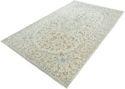 Corner detail of New Kashan rug showing border pattern and Wool pile