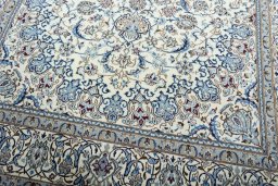 Close-up detail of 2000s Nain rug from Iran / Persia showing Wool weave