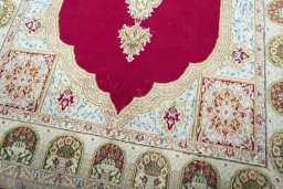 Close-up detail of 1970s Kerman rug from Iran / Persia showing Wool weave
