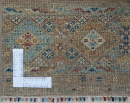 Corner detail of New Samarkand rug showing border pattern and Wool pile