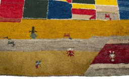Central medallion detail of 2000s Persian Gabbeh rug from Pakistan