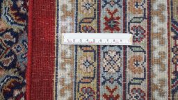 Corner detail of 1990s Jaipur rug showing border pattern and Wool pile