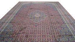 Backside of handmade 1990s Jaipur rug showing knot structure and weave density