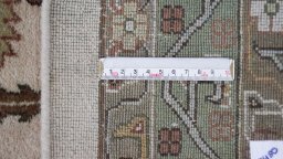 Corner detail of 1990s Jaipur rug showing border pattern and Wool pile