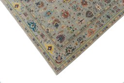 Backside of handmade New Farahan rug showing knot structure and weave density