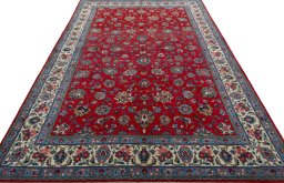 Surface texture of 2000s Sarough rug with natural Wool and intricate pattern