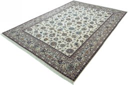 Corner detail of 2000s Mashad rug showing border pattern and Wool pile