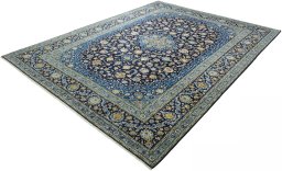 Corner detail of 2000s Kashan rug showing border pattern and Wool pile