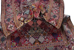 Surface texture of 2000s Kashan rug with natural Wool and intricate pattern