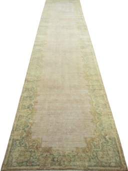 Surface texture of 1950s Vintage rug with natural Wool and intricate pattern
