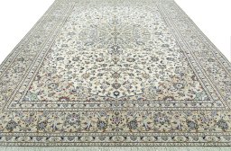 Surface texture of 2000s Kashan rug with natural Wool and intricate pattern