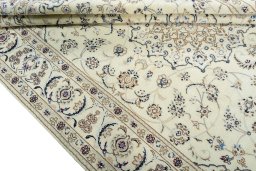 Close-up detail of 2000s Nain rug from Iran / Persia showing Wool weave