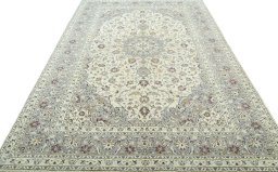 Surface texture of New Kashan rug with natural Cork and intricate pattern