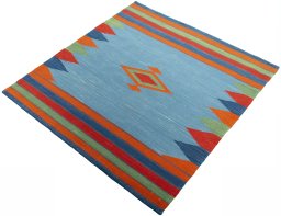 Corner detail of New Kilim Sofre rug showing border pattern and Wool pile