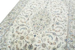 Backside of handmade New Kashan rug showing knot structure and weave density