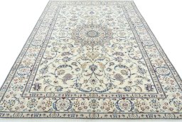 Surface texture of 2000s Nain rug with natural Wool and intricate pattern